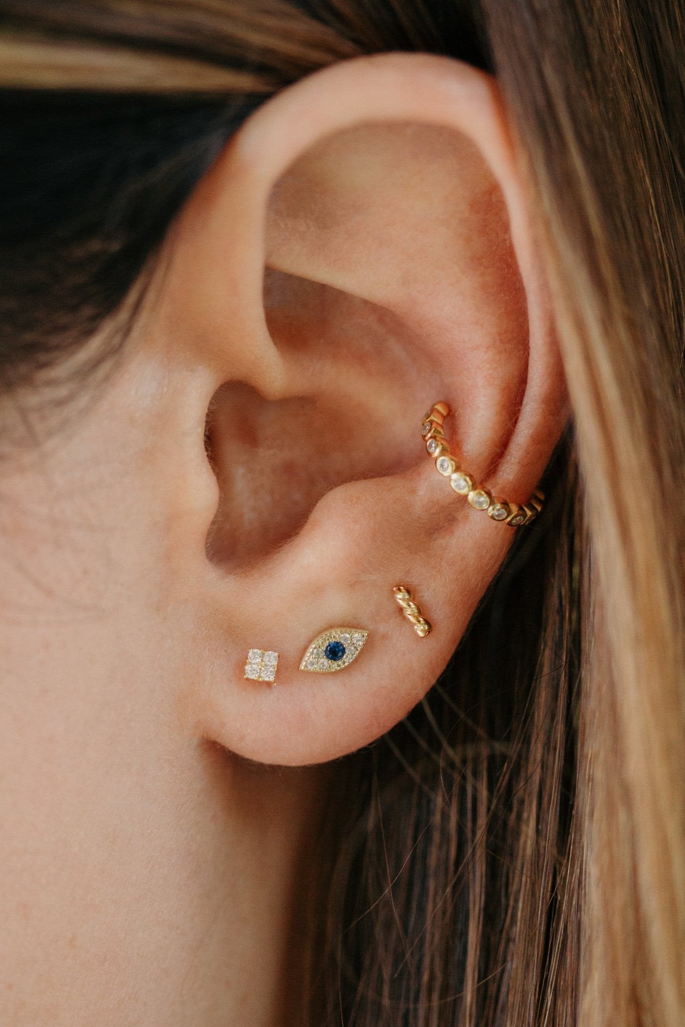 Mini stud evil eye earrings in gold. Dainty and simple evil eye design, perfect earrings to stack. mini stud earring, mini evil eye, evil eye stud, evil eye stud earring, evil eye, evil eye earring, evil eye dainty earring, blue evil eye, turkish evil eye, turkish eye, turkish eye earrings, evil eye jewelry, gold evil eye, gold evil eye earring, blue evil eye earring, dainty stud earring, dainty earring, gold eye earring