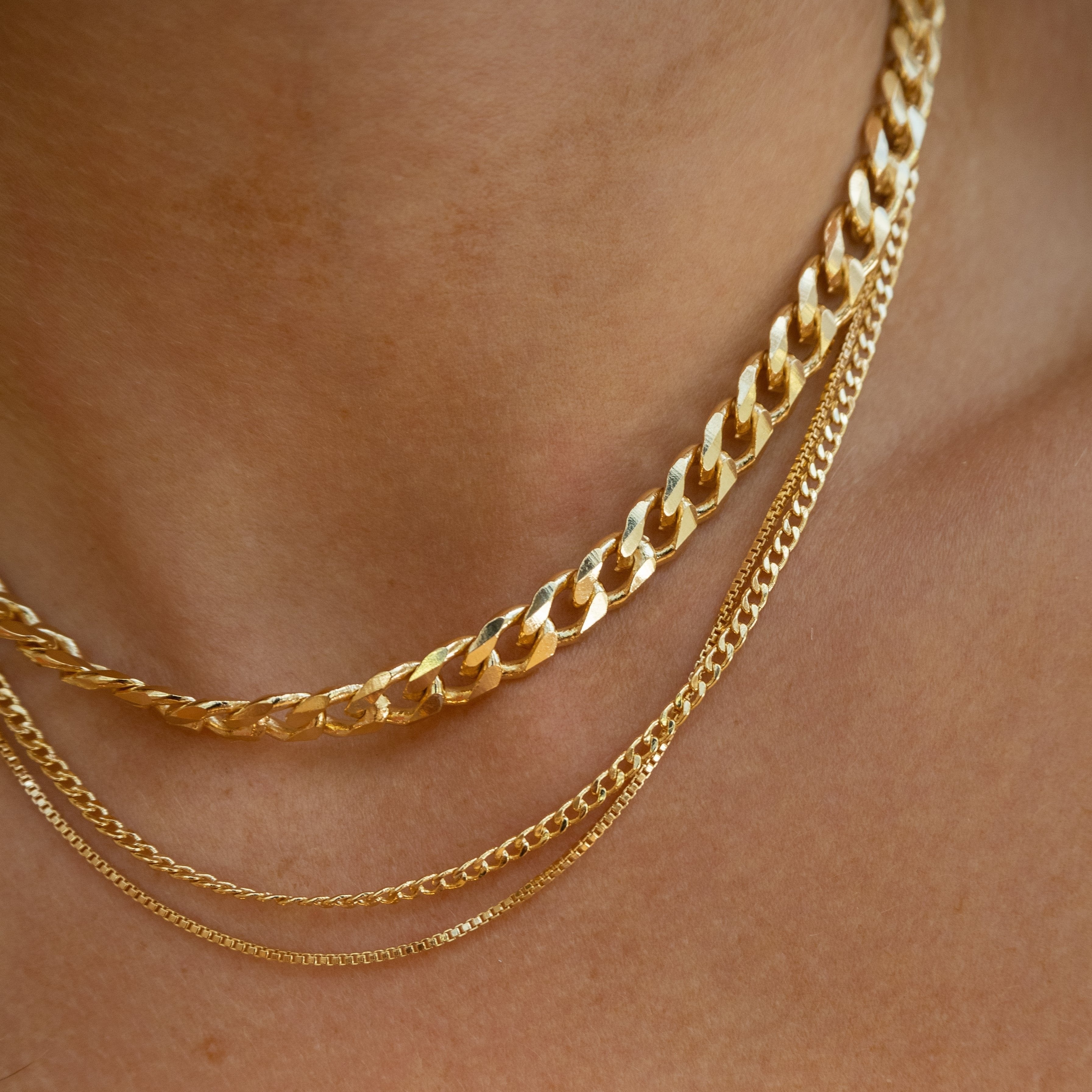 Chunky 14k gold filled cuban layering chain necklace by Vie en Bleu jewelry.cuban chain, thick chain, cuban gold chain, chunky chain, statement chain, chunky necklace, gold cuban necklace, thick gold necklace, gold filled cuban chain, gold filled chunky necklace, gold filled necklace, gold fill chain, 14k, 18k, water resistant, hypoallergenic,
