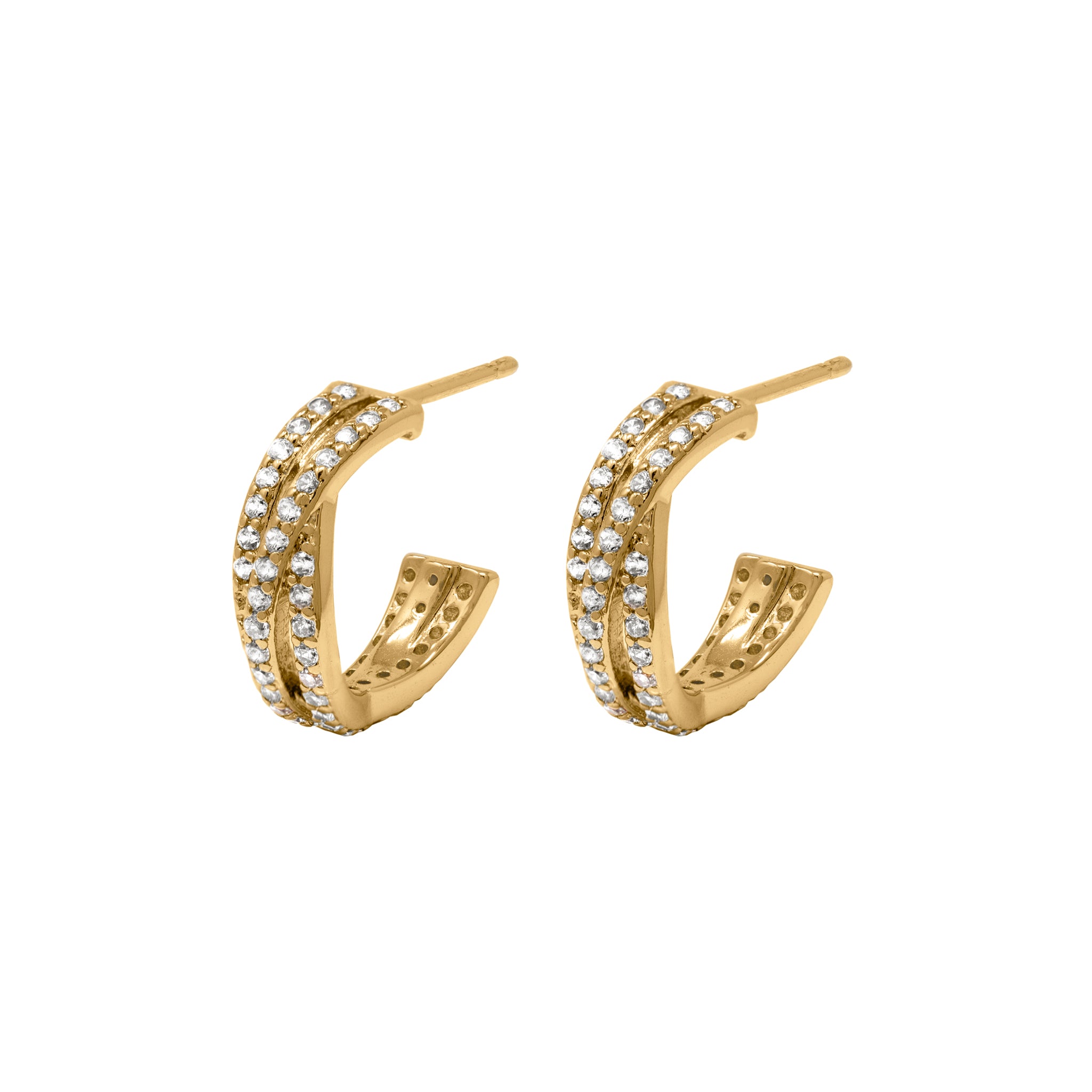 Dainty gold huggie earrings with cubic zirconia.