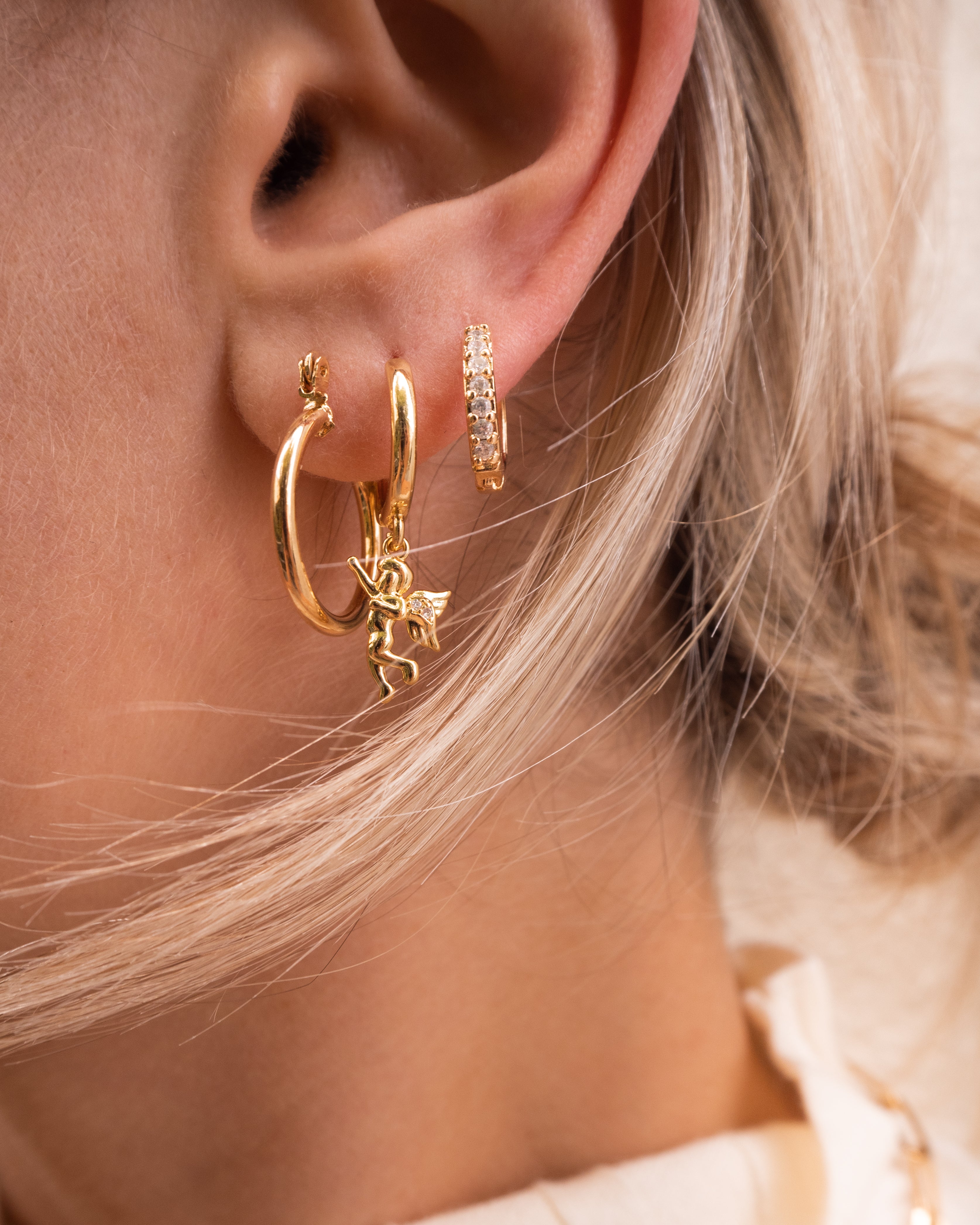 dainty huggie hoops, huggie earrings, gold filled huggie, thin hoop earrings, stacking earrings, stacking hoops, angel earrings, earring with angel, huggie angel charm, dainty hoop earrings, gold filled earirngs